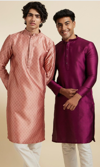 Two men wearing traditional Indian kurtas in festive colors with elegant ethnic design